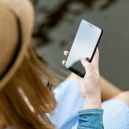 A person viewing their smartphone.